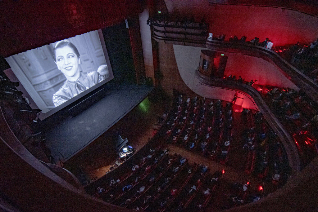Photograph of projection of Momo inside Teatro Verdi in Pordenone